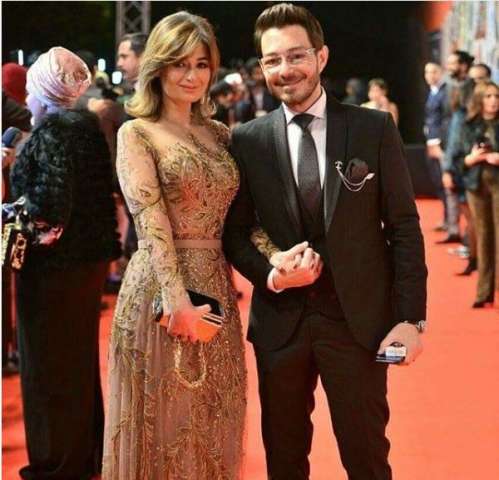 الفنان أحمد زاهر وزوجته 