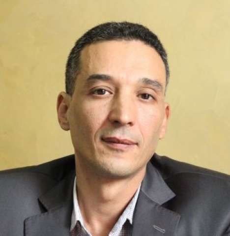 الكاتب علاء طه